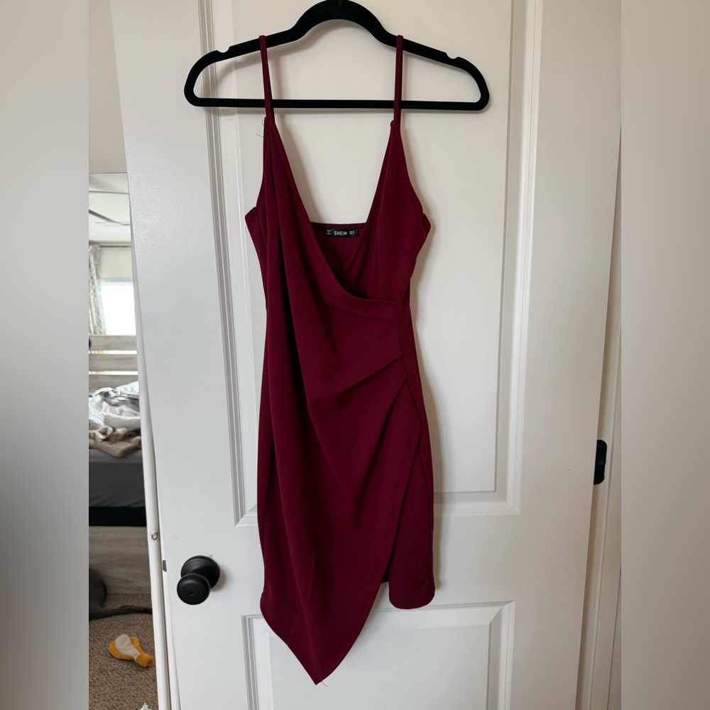 Burgundy SHEIN dress. Asymmetrical bottom, low cut mini dress. Size small fitted